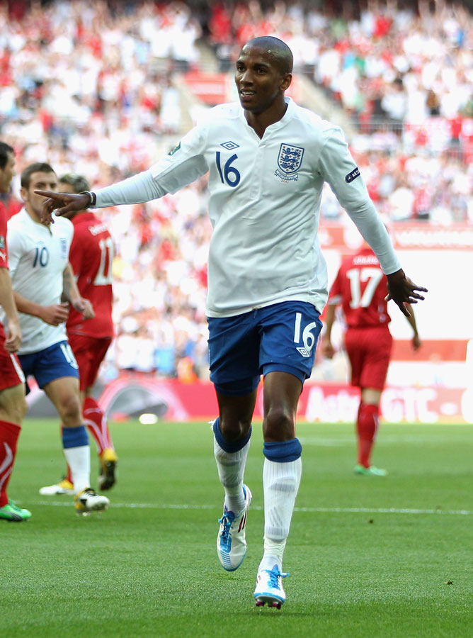 Ashley Young celebrates after scoring against Switzerland at Wembley Stadium.